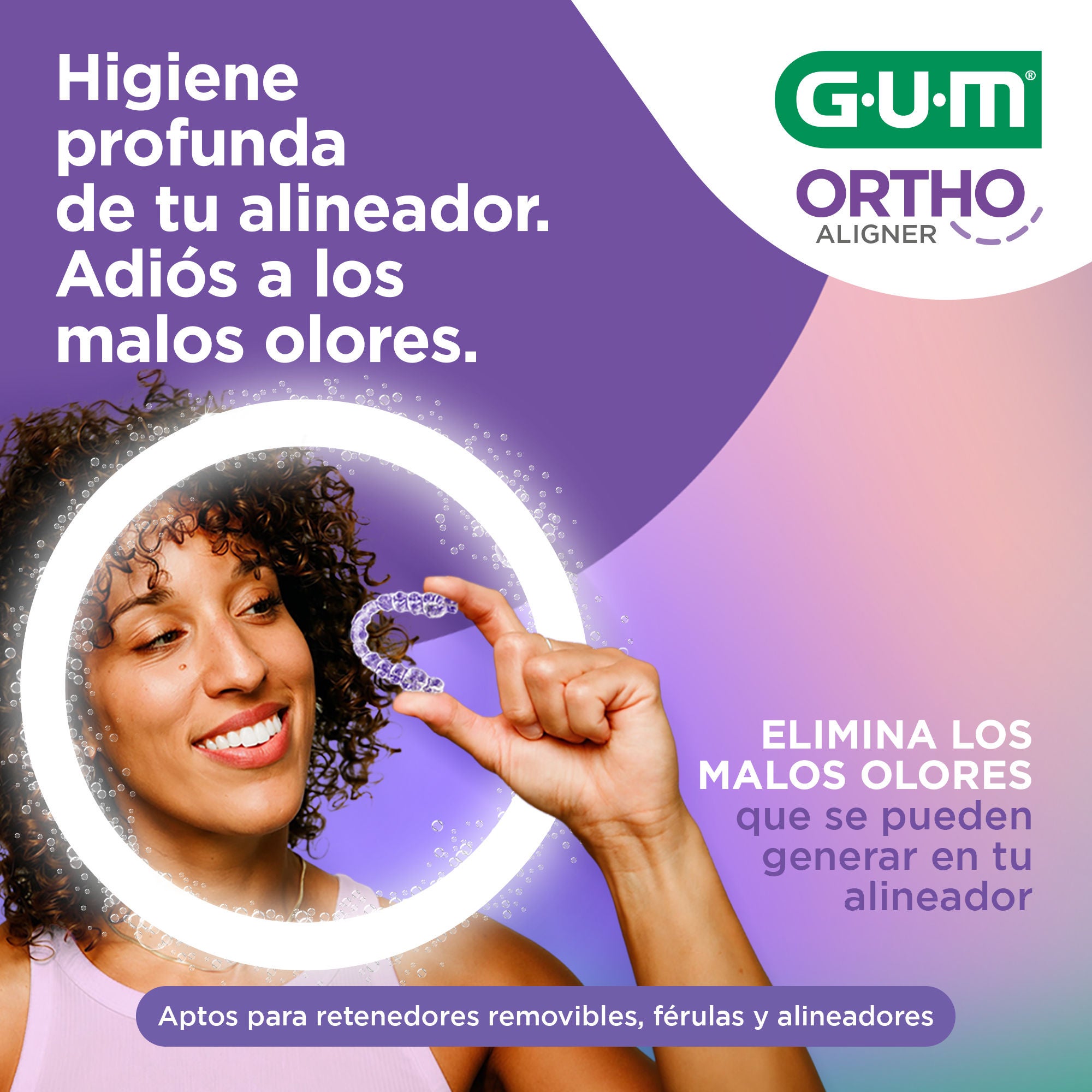 Ad-GUM-ORTHO-Aligner-Smiling-Lady-with-Aligner-in-Hand-2000x2000-ES.jpg