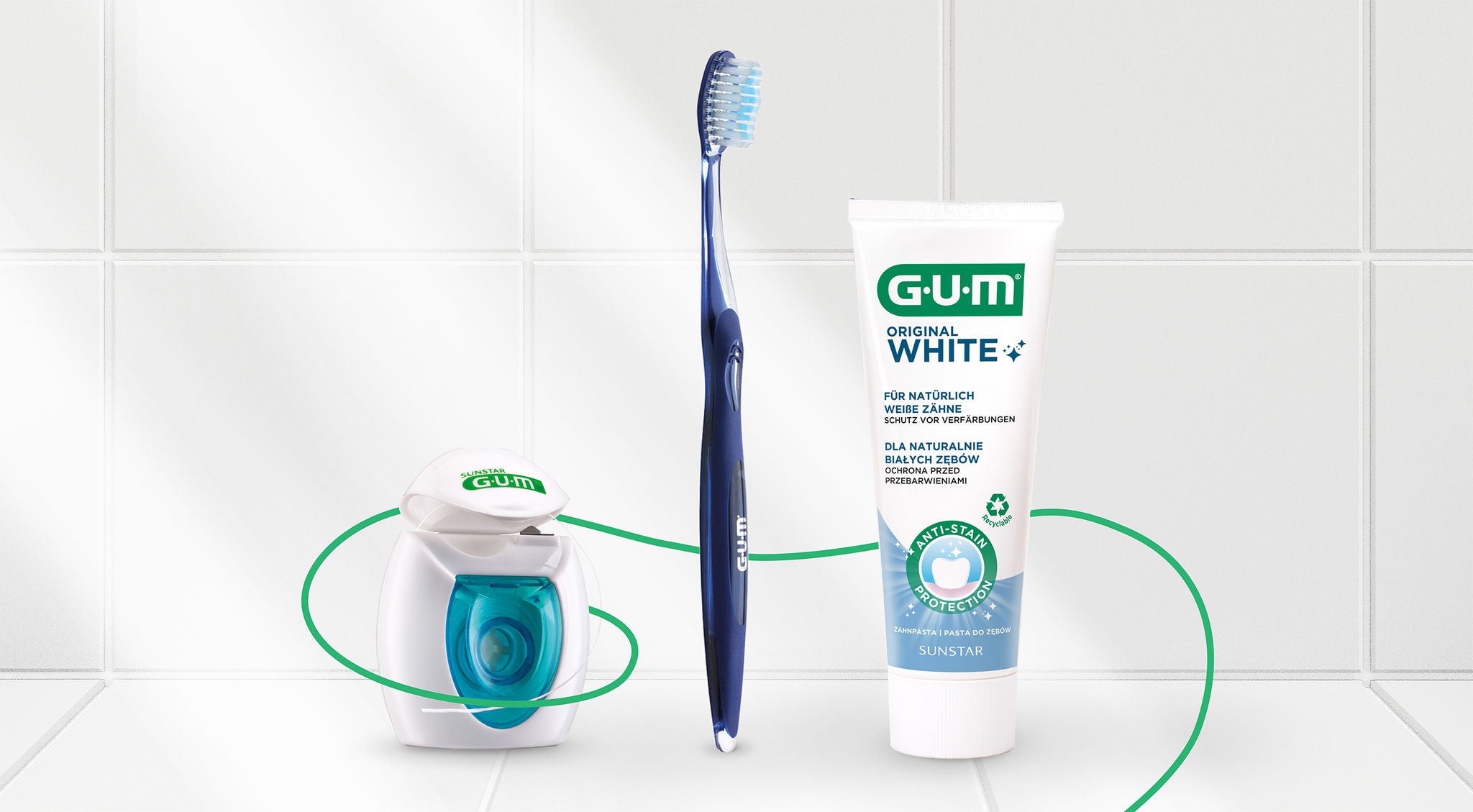 GUM Original weiße Zahnseide; GUM Original Weiße Zahnpasta und Bürste. 