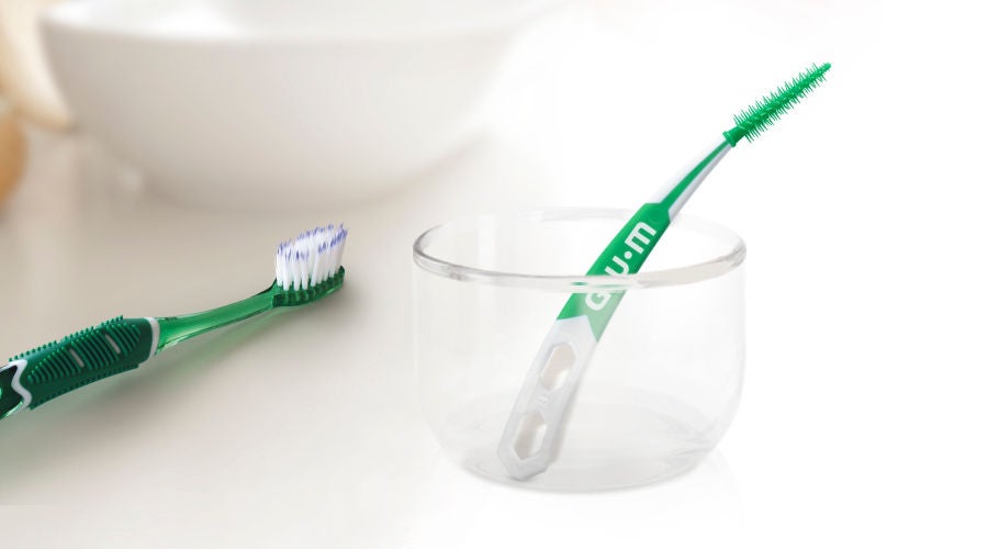 In-context-GUM-SOFT-PICKS-PRO-in-the-bathroom-with-PRO-Toothbrus