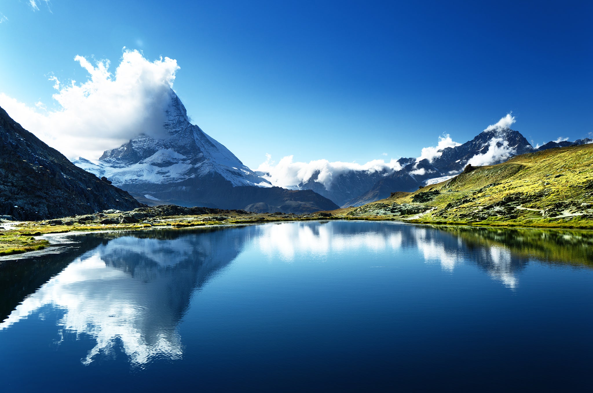 Reflection of Matterhorn in lake Riffelsee, Zermatt, Switzerland