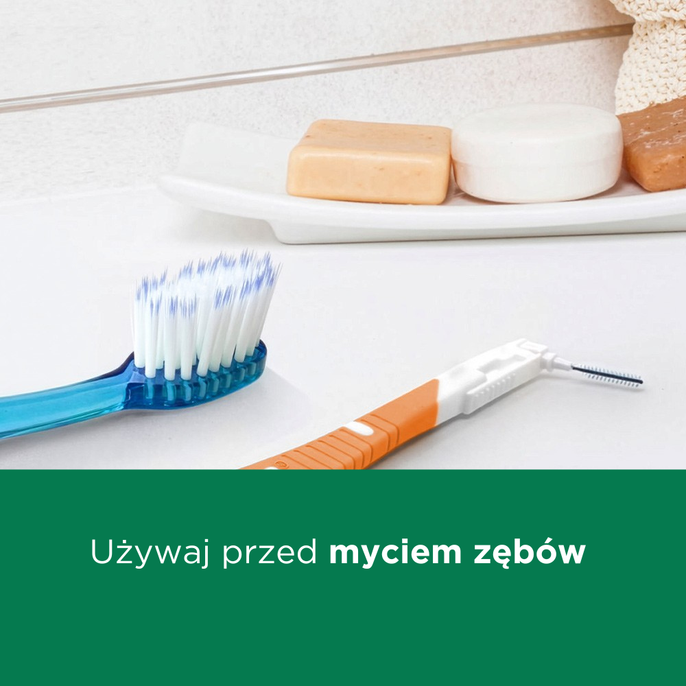 GUM BI-DIRECTION interdental brush shown flat with GUM PRO toothbrush