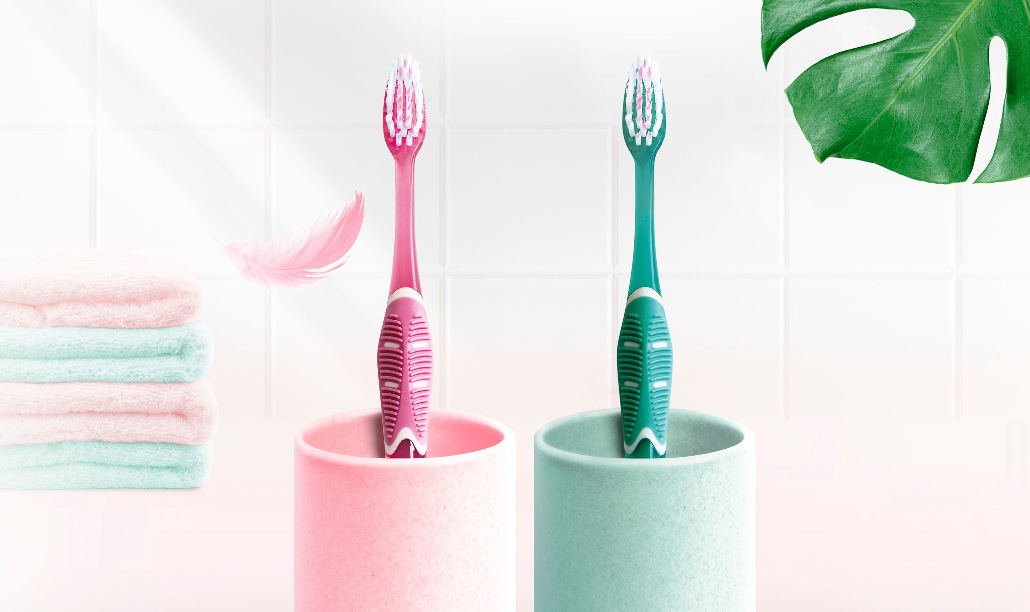Two GUM PRO SENSITIVE Toothbrushes in their glass