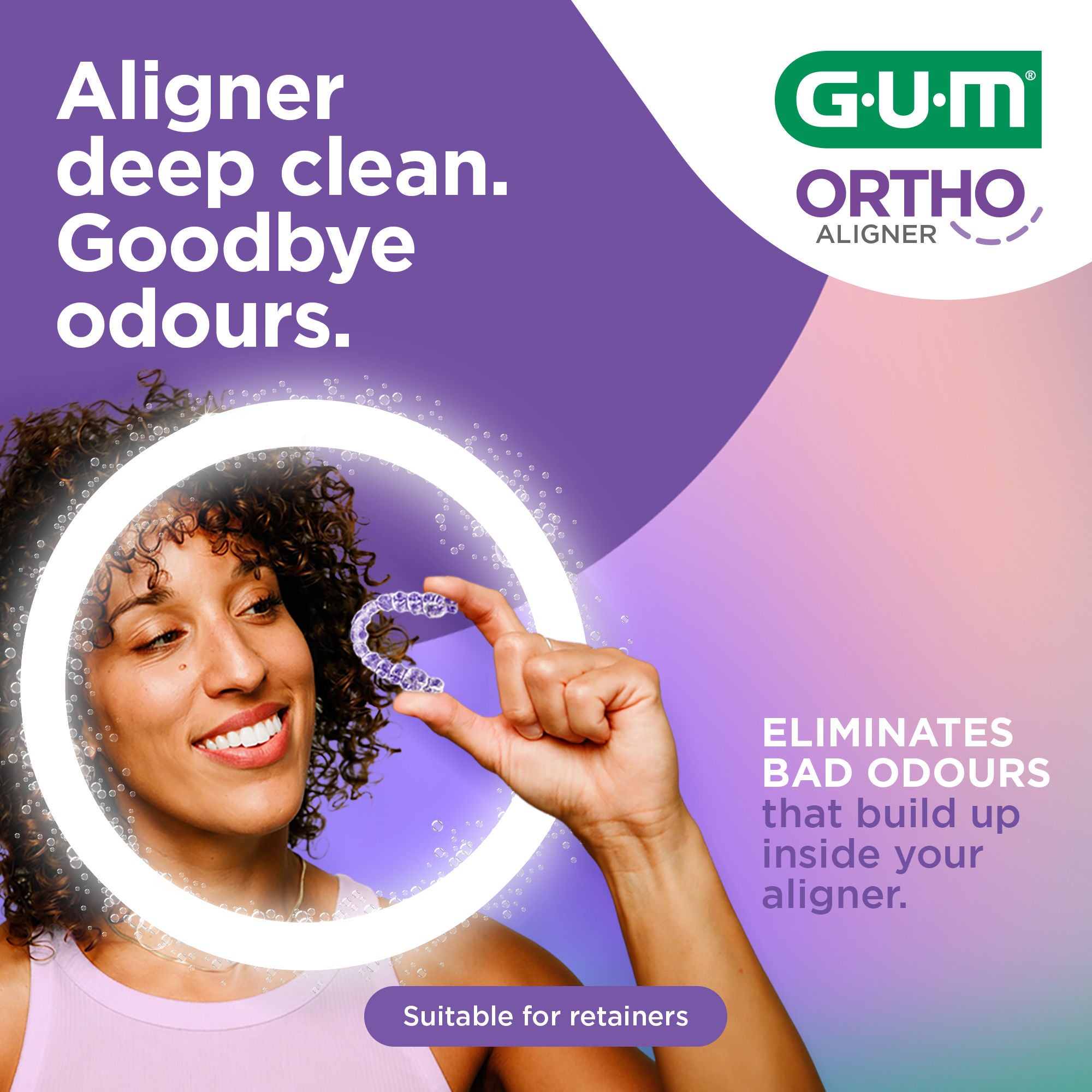 Ad-GUM-ORTHO-Aligner-Smiling-Lady-with-Aligner-in-Hand-Open-file-2000x2000.jpg