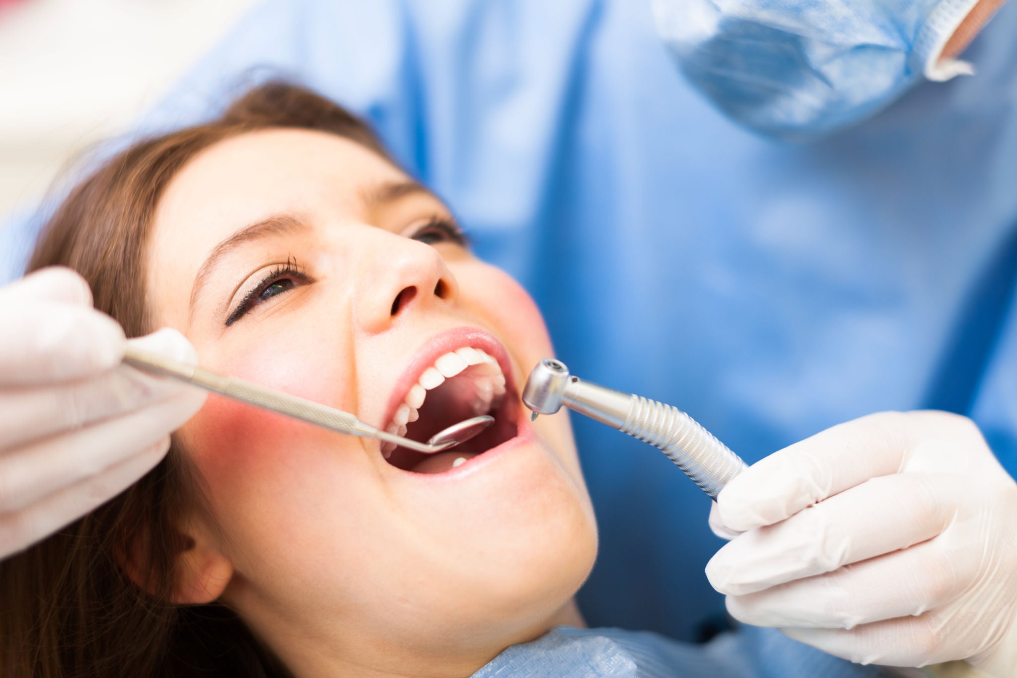 Woman receiving a dental treatment