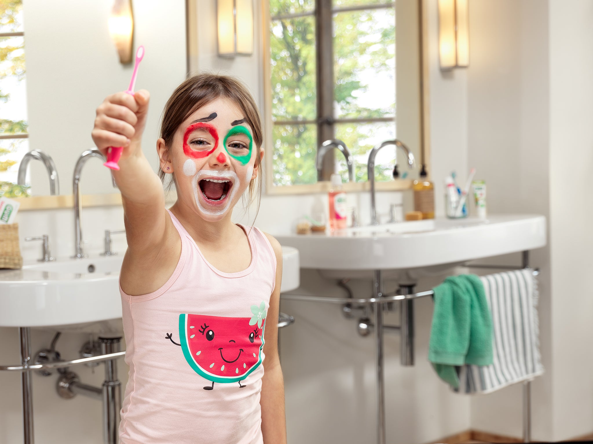 In-context-GUM-KIDS-TB-girl-holding-in-bathroom