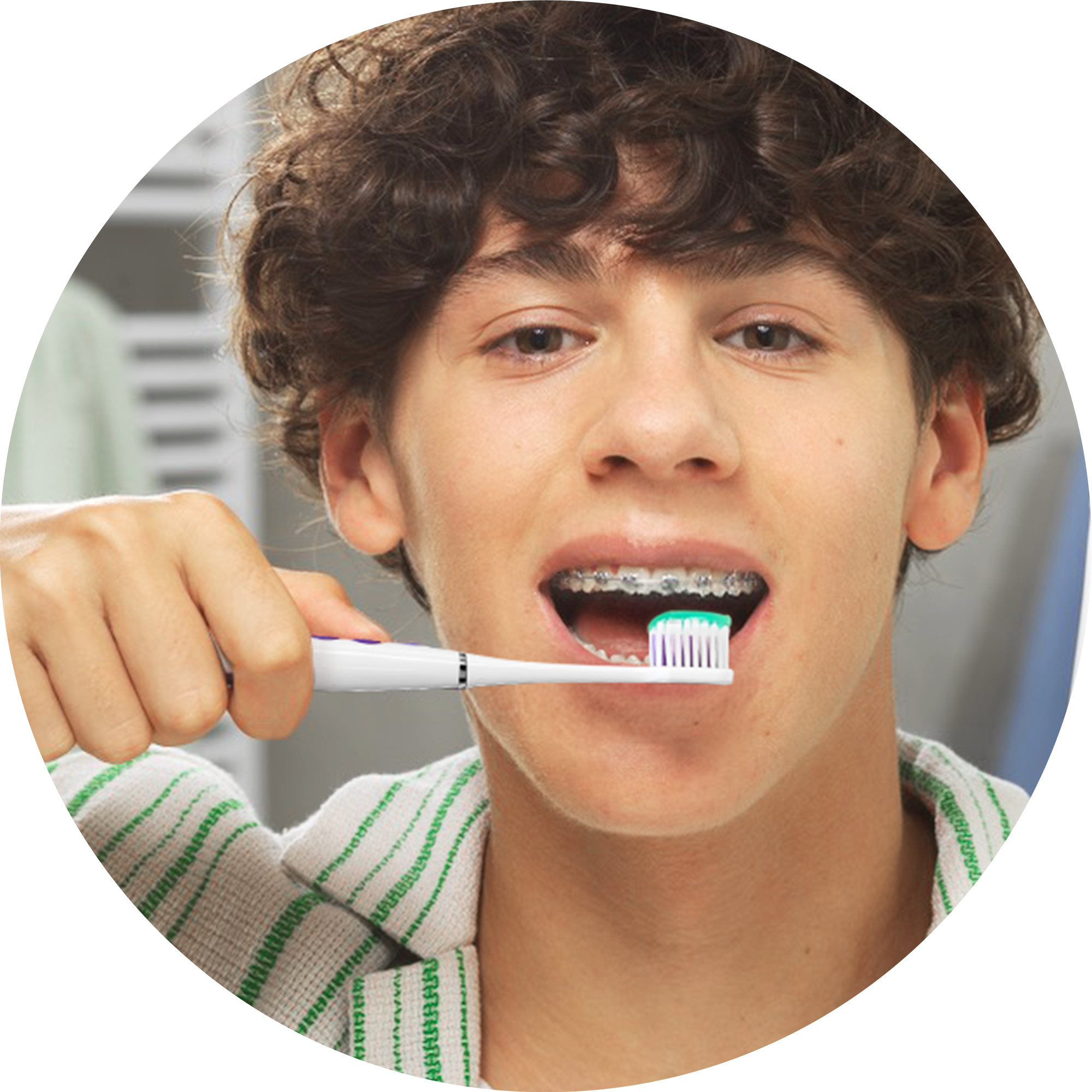 GUM-SONIC-ORTHO-Boy-with-braces.jpg