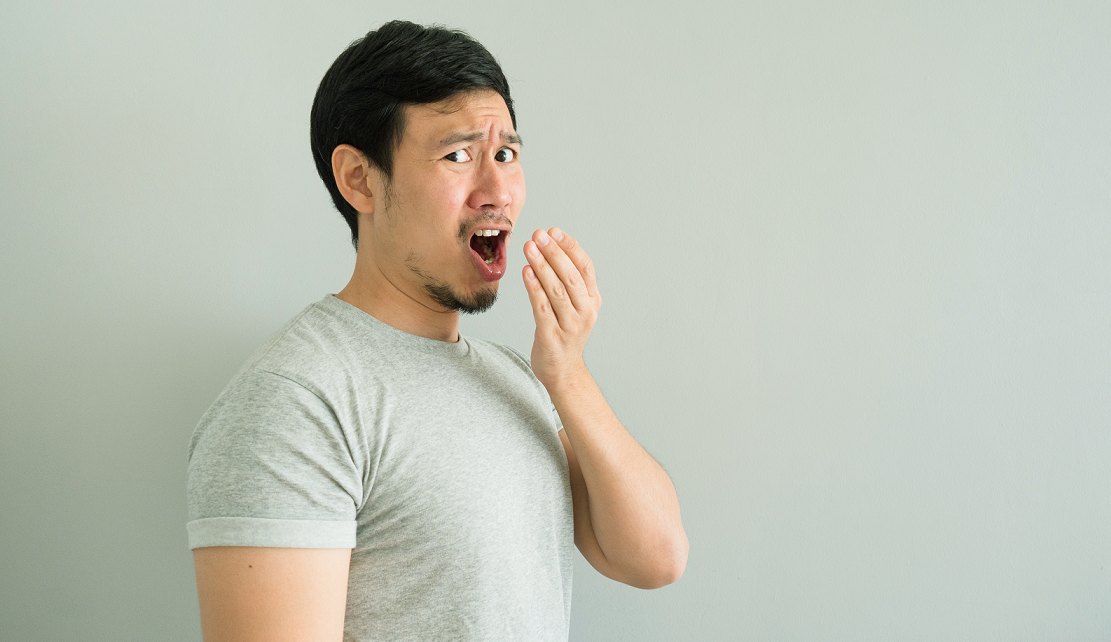 Man with bad breath