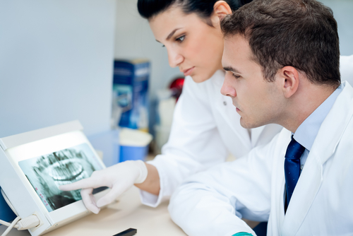 OCP-Dentists-looking-at-xray.